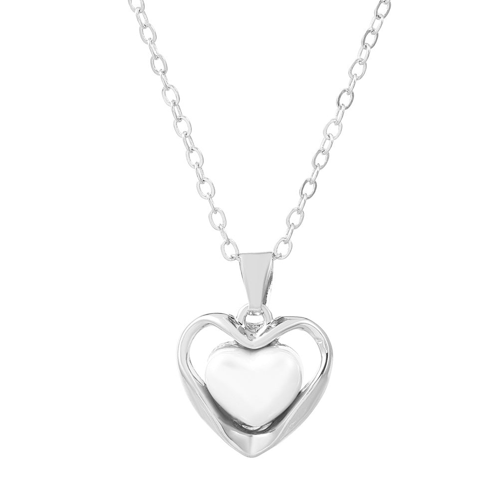 Colliers de clavicule de luxe légers en perles creuses en forme de cœur