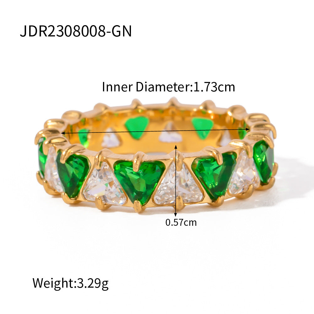 Goldfarbene Ringe aus Edelstahl mit eingelegtem dreieckigem Zirkon