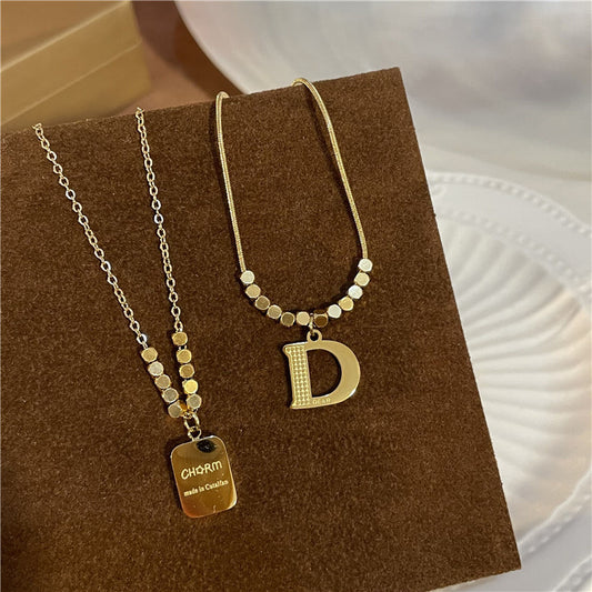 Colliers de pull à glands capricieux de lettre de conception en acier