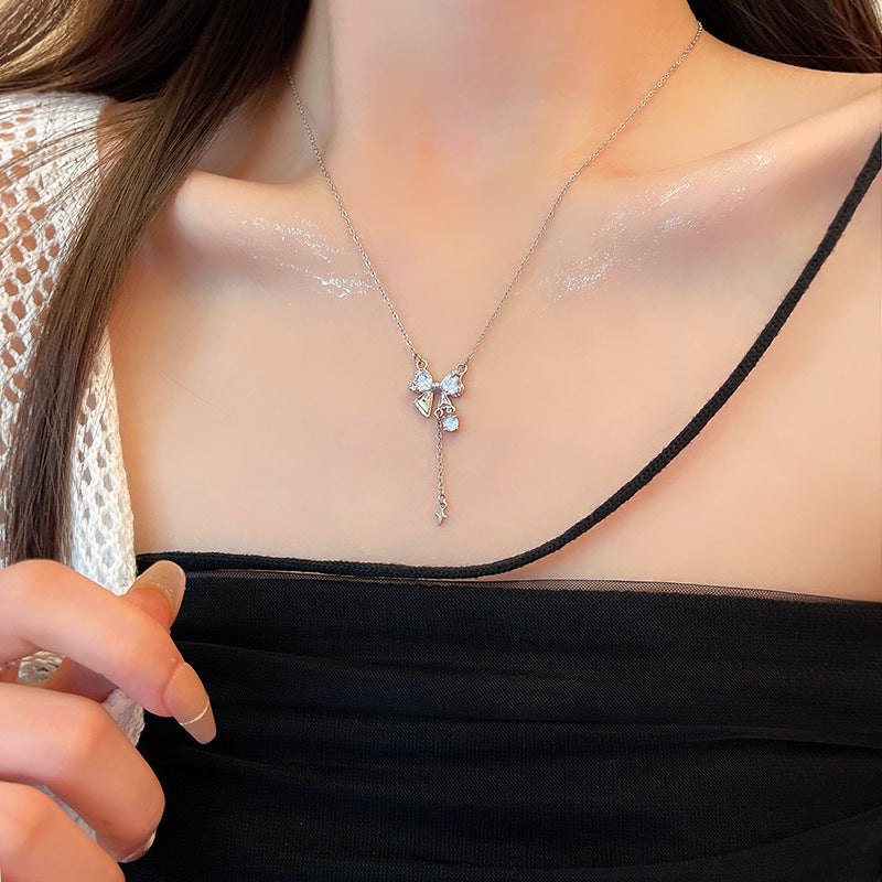 Schlüsselbeinhalsketten aus raffiniertem Zirkon mit langer Quaste und Schleife