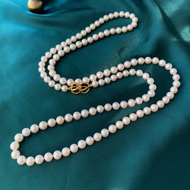 Colliers de perles à chaîne de pull longue en nacre pour femmes