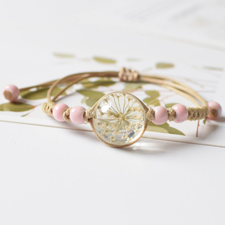 Bracelets de couple frais préservés de spécimens de fleurs séchées étoilées