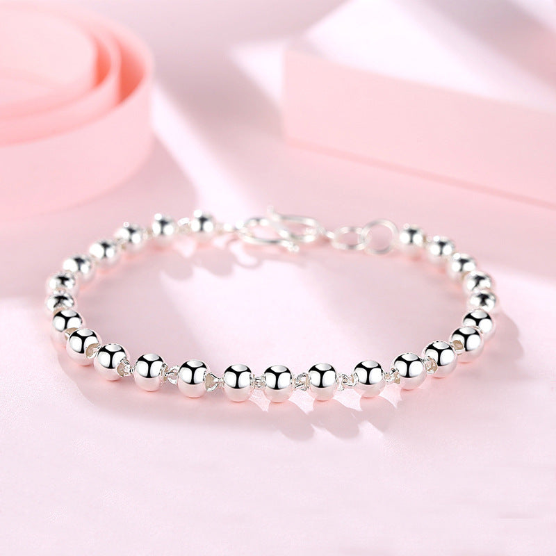 Bracelets femme petites perles rotatives en argent sterling