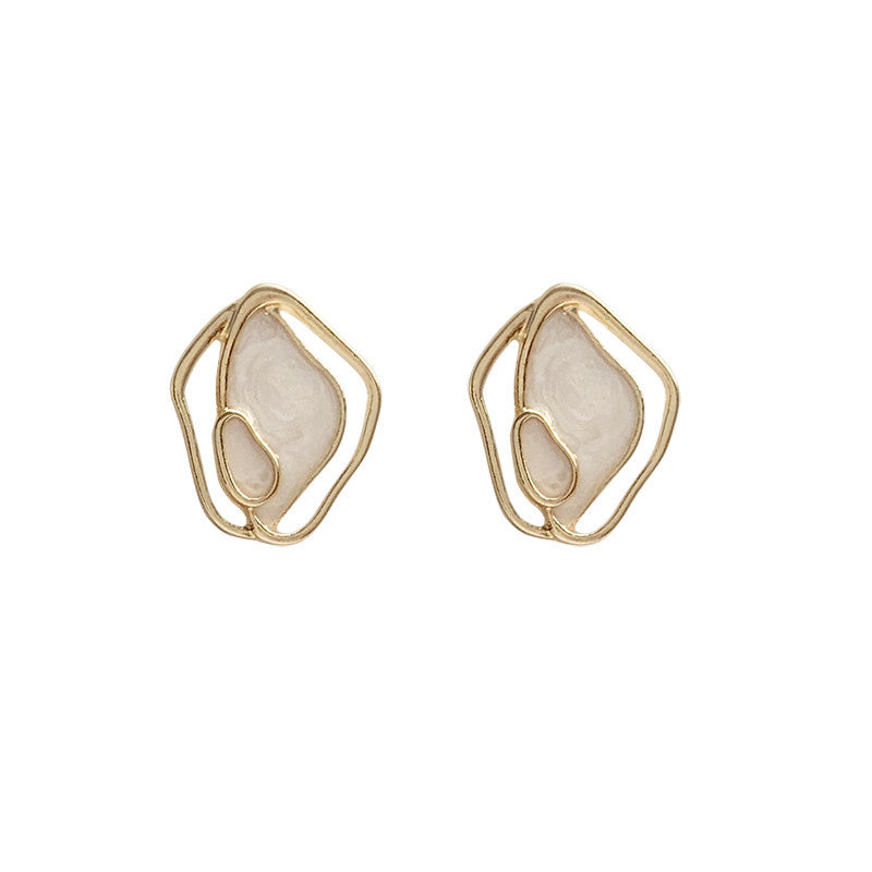 Boucles d'oreilles froides de personnalité de coquille géométrique simple et gracieuse pour femmes