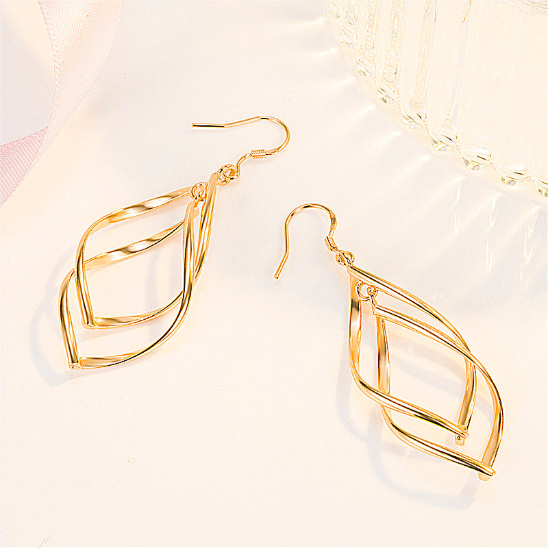 Accessoires Vergoldete Ohrringe mit Doppelschnalle