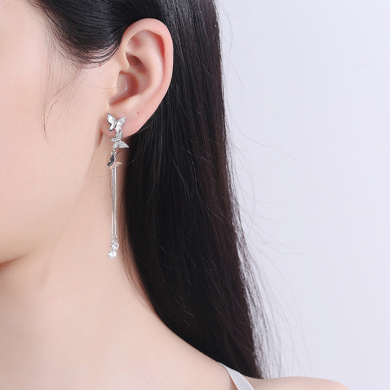 Boucles d'oreilles asymétriques féeriques de niche capricieuses, haut sens