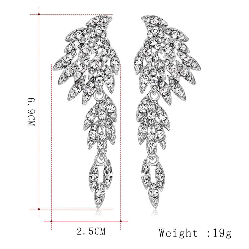 Übertriebene, modische, lange Legierungs-Diamant-Ohrringe mit Quaste