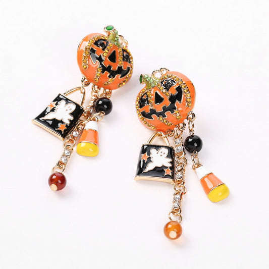 Boucles d'oreilles d'Halloween amusantes en forme de citrouille dégoulinante d'huile créative