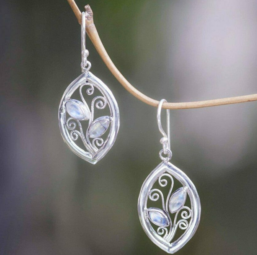 Inlaid Sea Blue Topaz Female Creative Rotational Water Drop Earrings