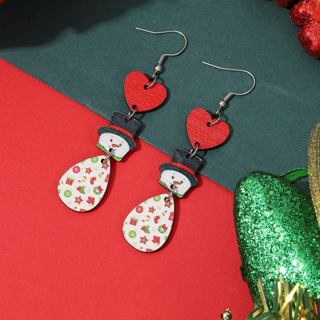 Boucles d'oreilles de Noël simples en forme de dessin animé