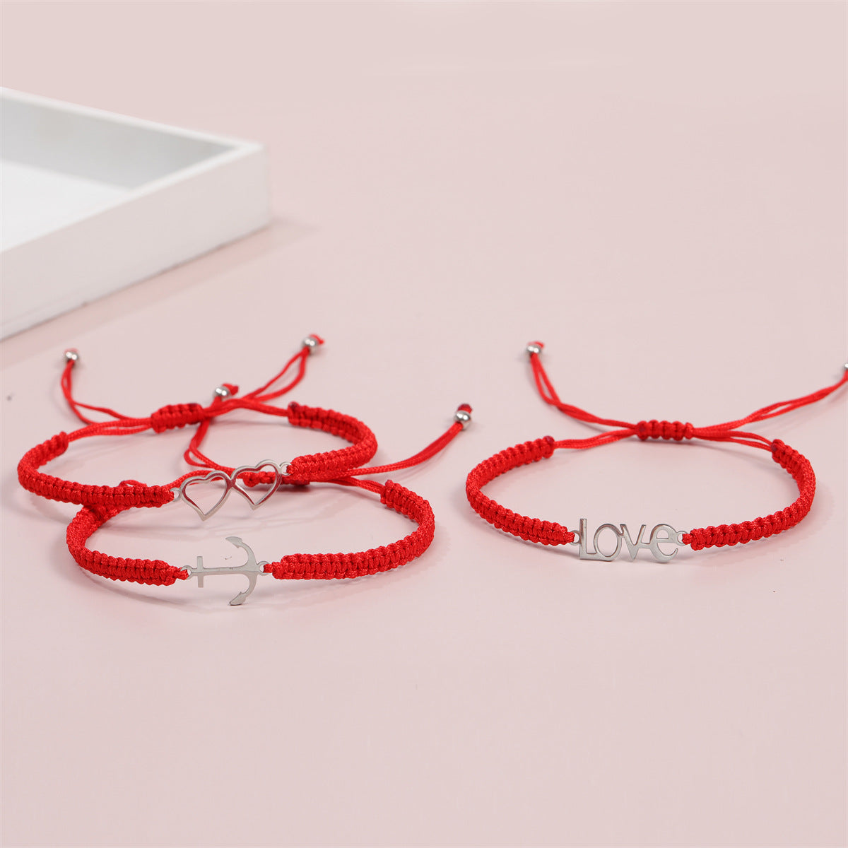 Bracelets simples en acier inoxydable avec corde rouge et papillon