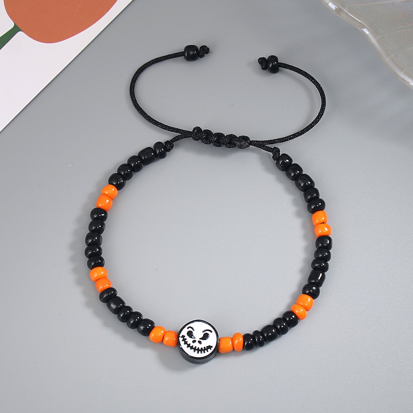 Farblich passende Halloween-Kürbis-Geistergesichts-Armbänder für Damen