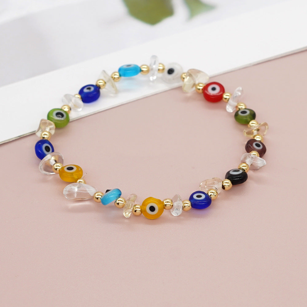 Bracelets boulier style boules dorées yeux en verre