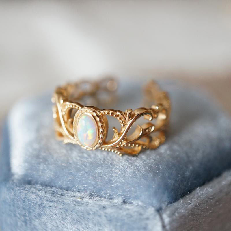 Women's Opal Retro Three-dimensional Hollow Vine Pattern Ring