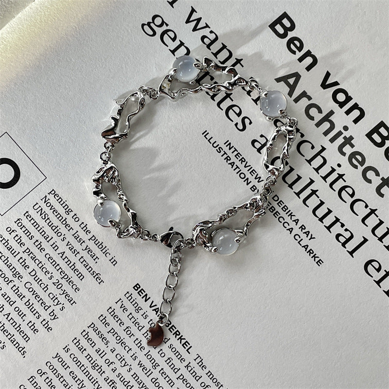 Bracelets de perles incrustés d'agate blanche de conception de pierre de lune en acier titane