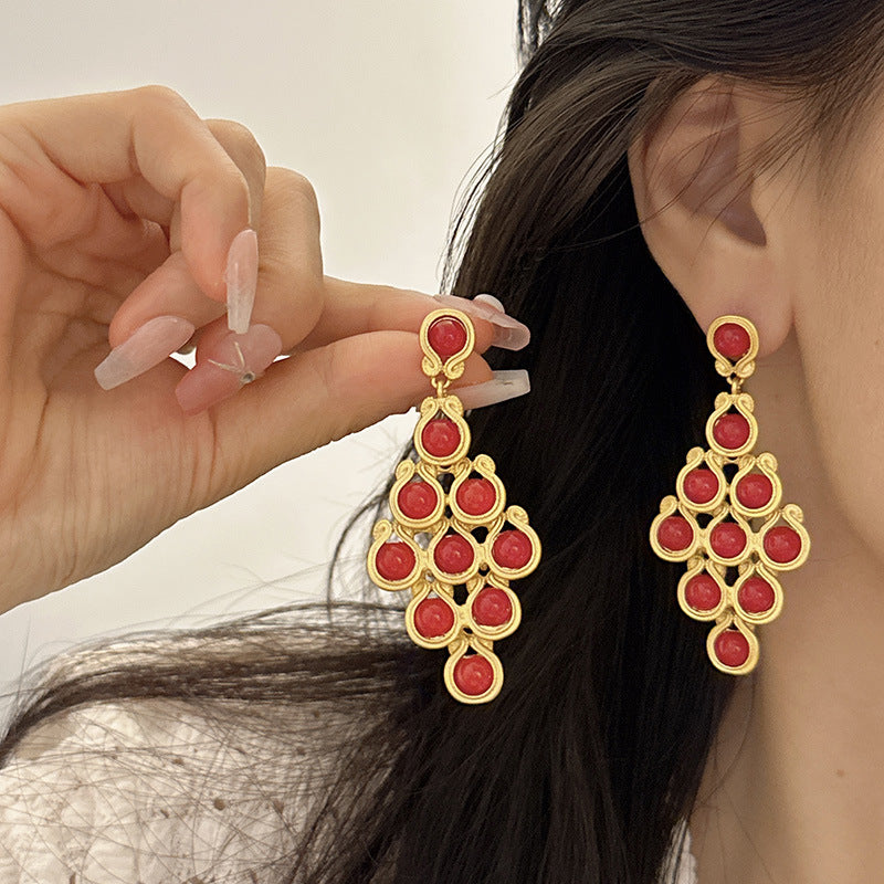 Boucles d'oreilles longues en écailles de queue de phénix émaillées de couleur rouge