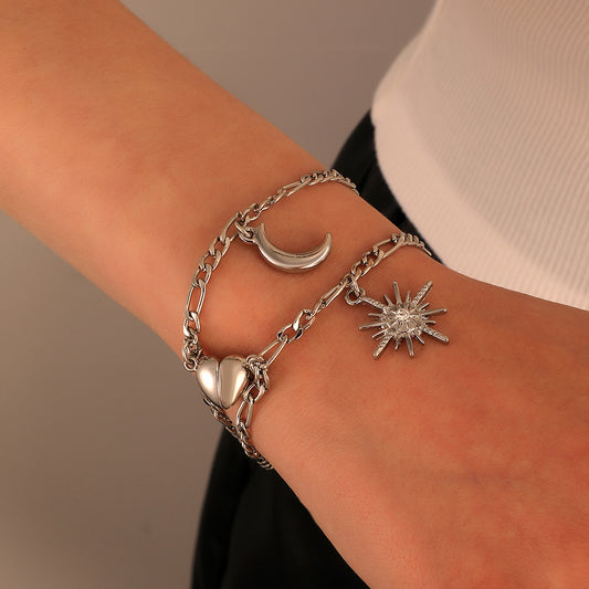 Damen-Sonne-Mond-Armbänder mit magnetischer Saugwirkung und kaltem Wind