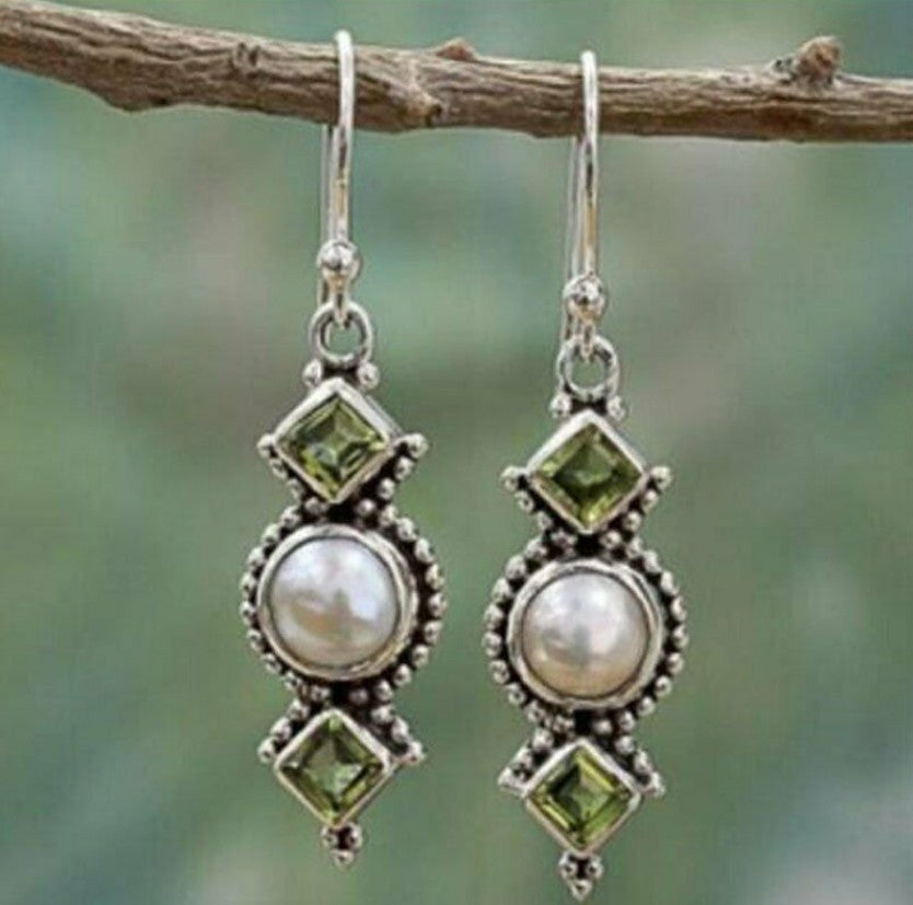 Inlaid Sea Blue Topaz Female Creative Rotational Water Drop Earrings