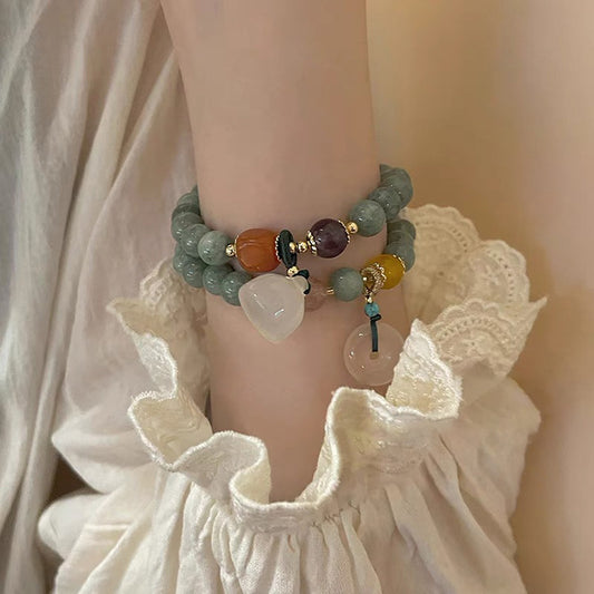 Bracelets gracieux personnalisés simples de niche féminine perlée de résine de pierre naturelle