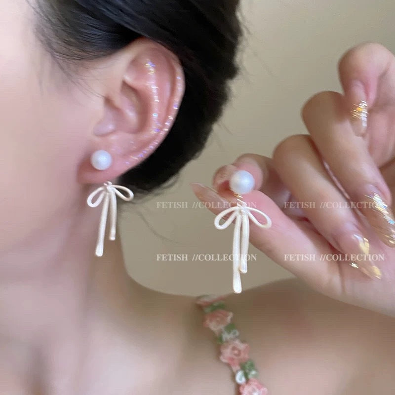 Women's Exquisite Bow Tassel Mosquito Coil Earless Light Luxury Minority Ear Clip
