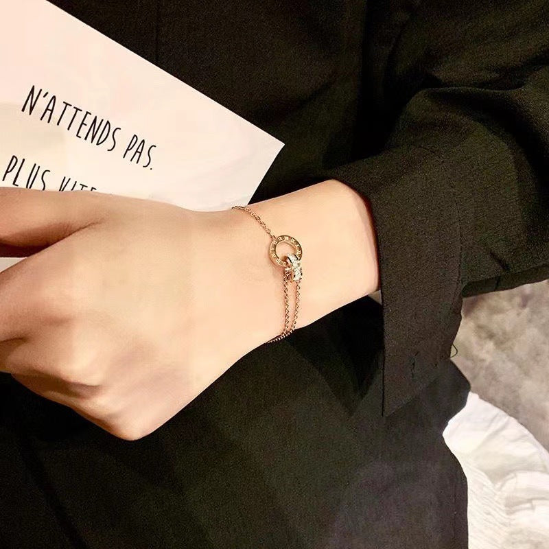 Women's Roman Font Titanium Steel Gold Design Light Bracelets