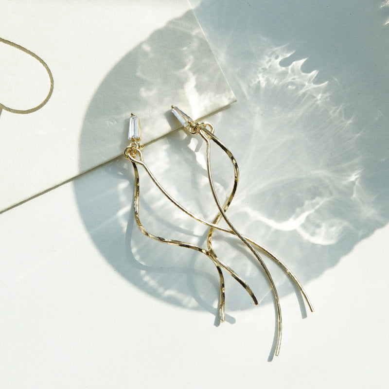 Women's Elegant Long Tassel Mosquito Coil Show Face Small Earrings
