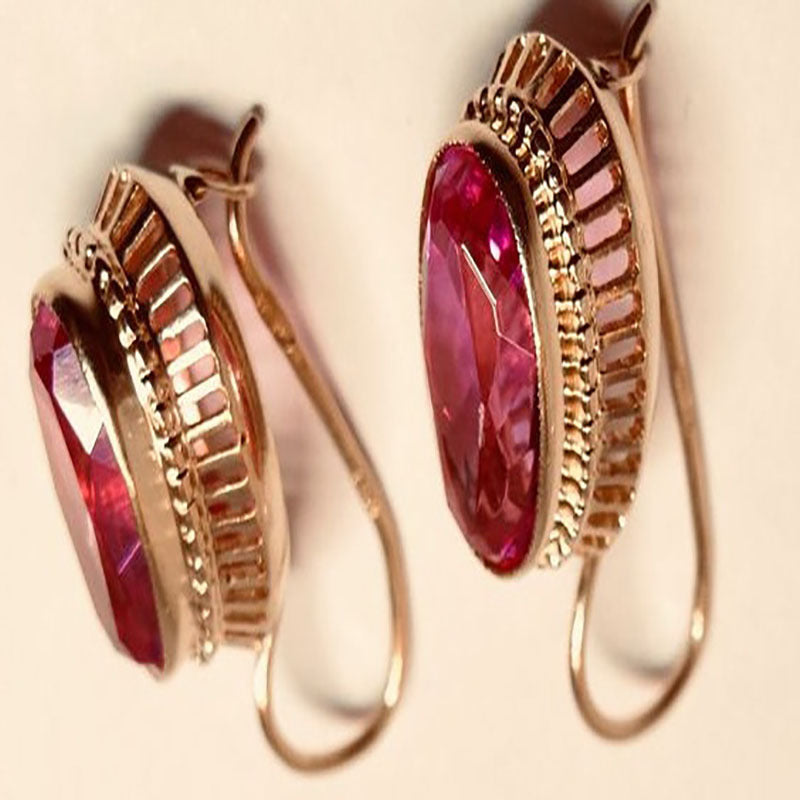 Women's Fashion Simple Golden Hollow Type Red Gem Earrings