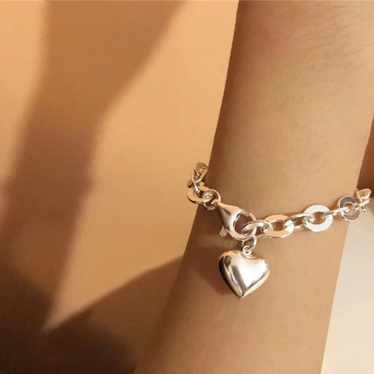 Herzförmige herzförmige Armbänder aus pfirsichfarbenem Sterlingsilber