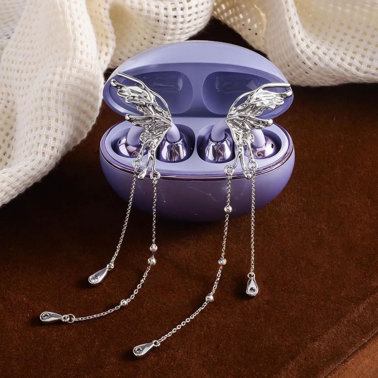 North Headset Button Hollow Butterfly Tassel Earrings