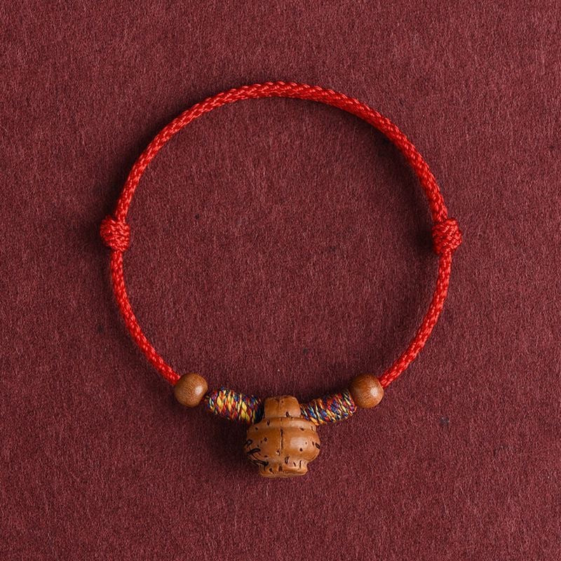 Women's & Men's Peach Wood Pit Red Rope Surprise Born Adult Bracelet