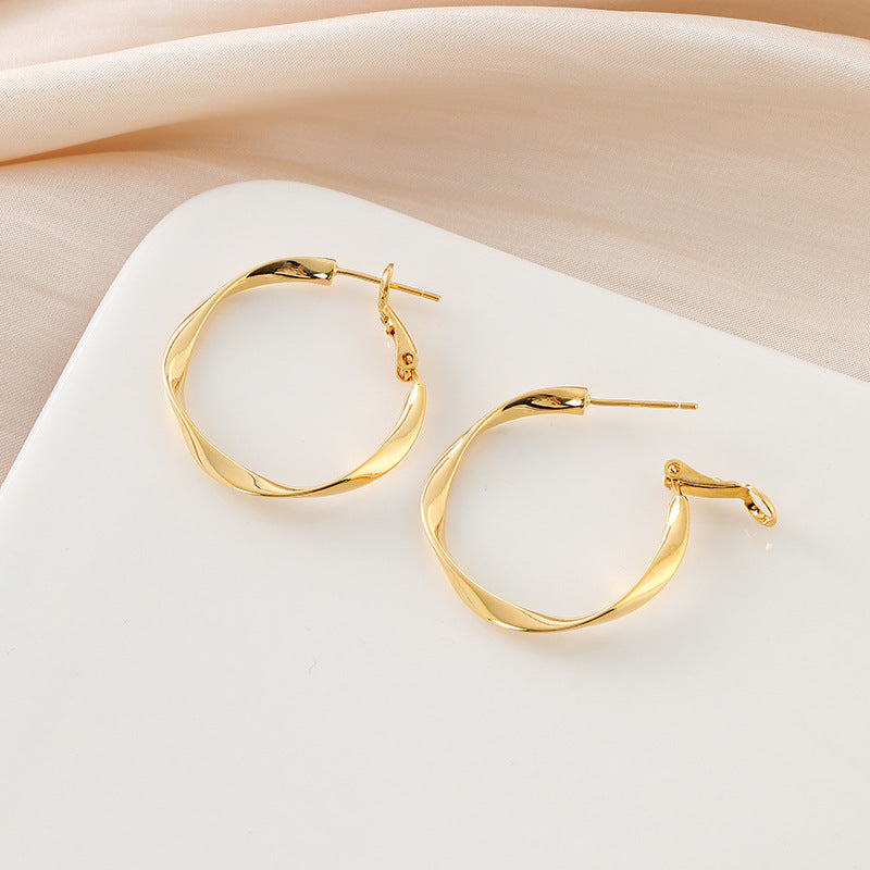 Simple Metal Wave Twisted Round Spiral Ear Clip