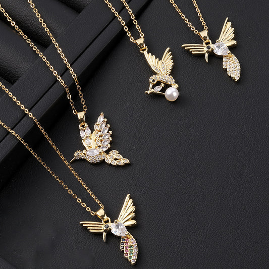 Colliers en titane avec pendentif en forme de colibri et de perles pour femme, oiseau volant