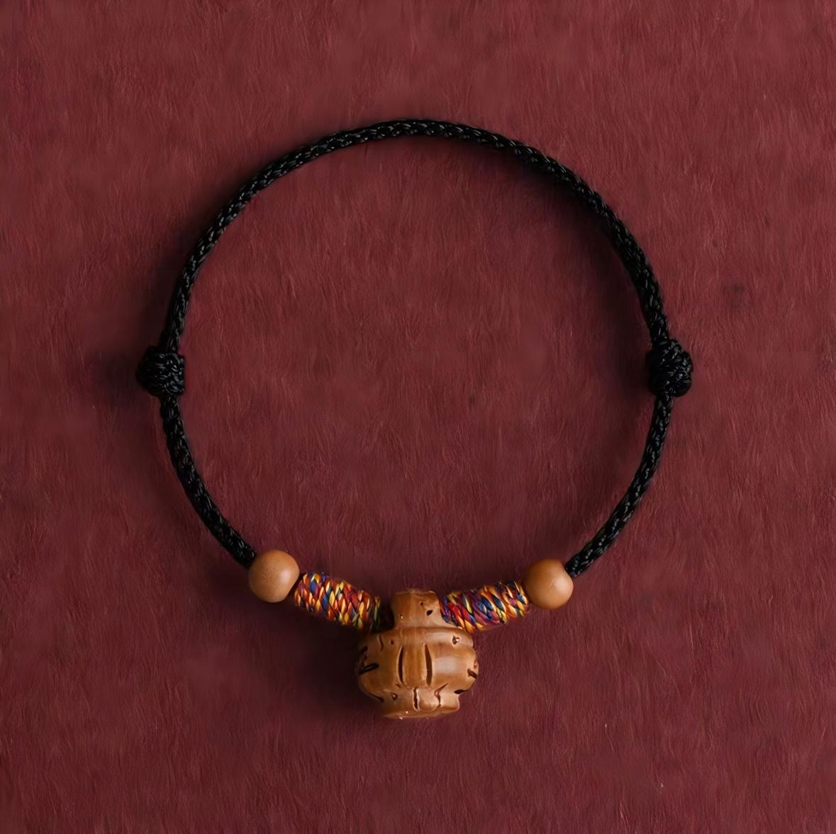 Women's & Men's Peach Wood Pit Red Rope Surprise Born Adult Bracelet