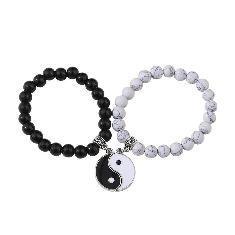 Yin und Yang Klatsch runde Paar-Freunde-Armbänder