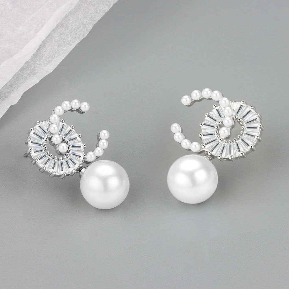 Boucles d'oreilles de mode de conception de niche féminine à double perle de luxe