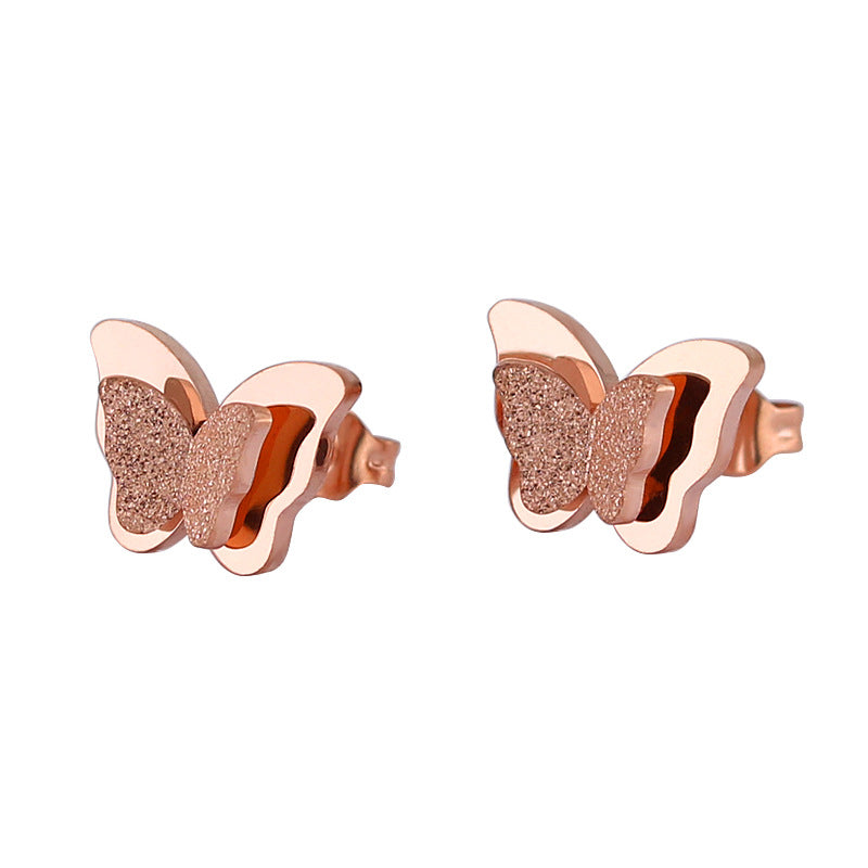 Boucles d'oreilles en titane double papillon givré pressées au sable pour femmes