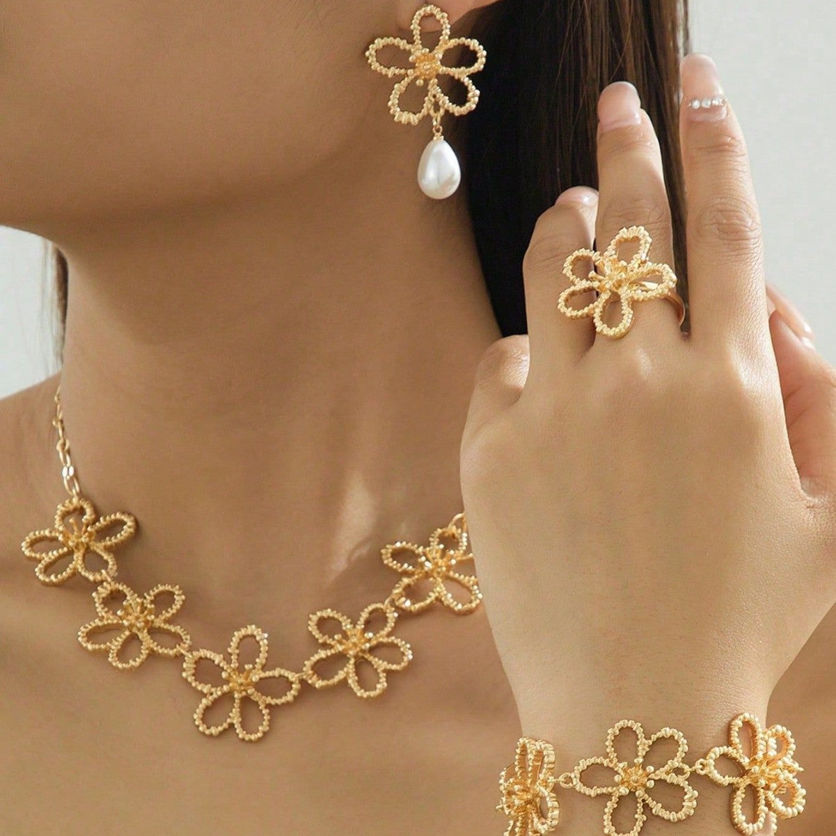 Fashion Metal Hollow Flower Stitching Ear Female Light Luxury Jewelry Set