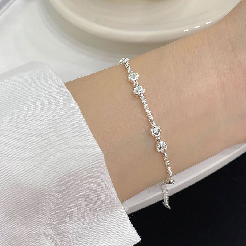 Bracelets en petites pièces avec nœud en argent sterling