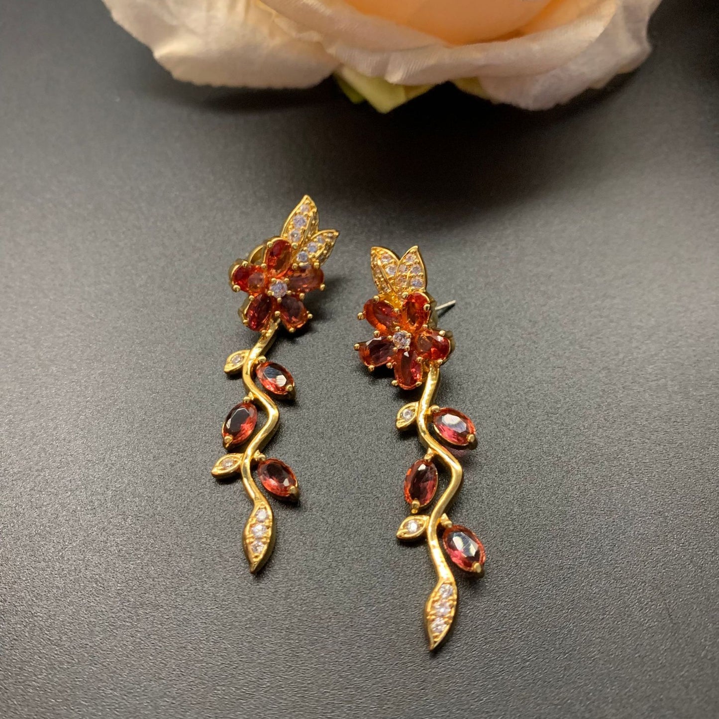 Niche d'aiguille fleurs colorées modélisation boucles d'oreilles colorées