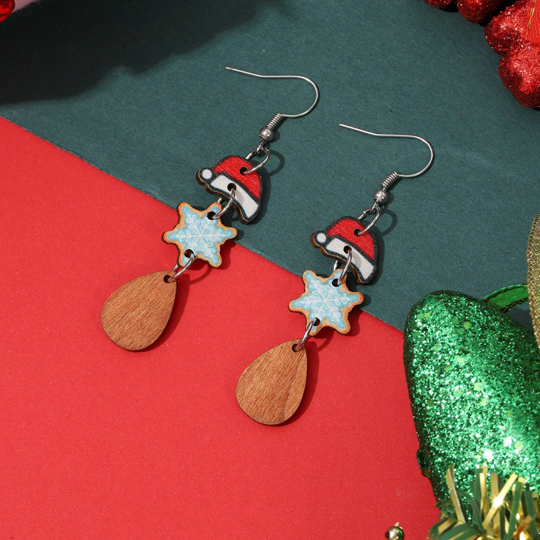 Boucles d'oreilles de Noël simples en forme de dessin animé