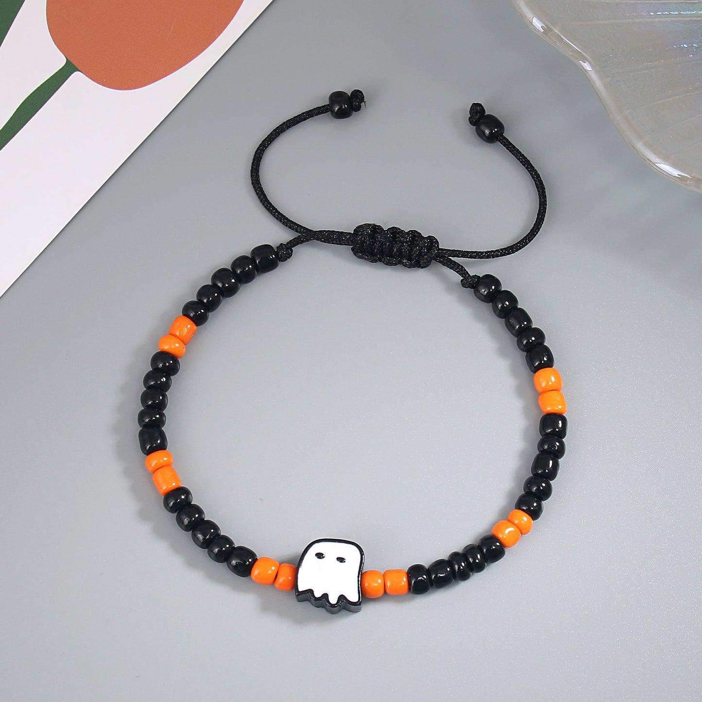 Farblich passende Halloween-Kürbis-Geistergesichts-Armbänder für Damen