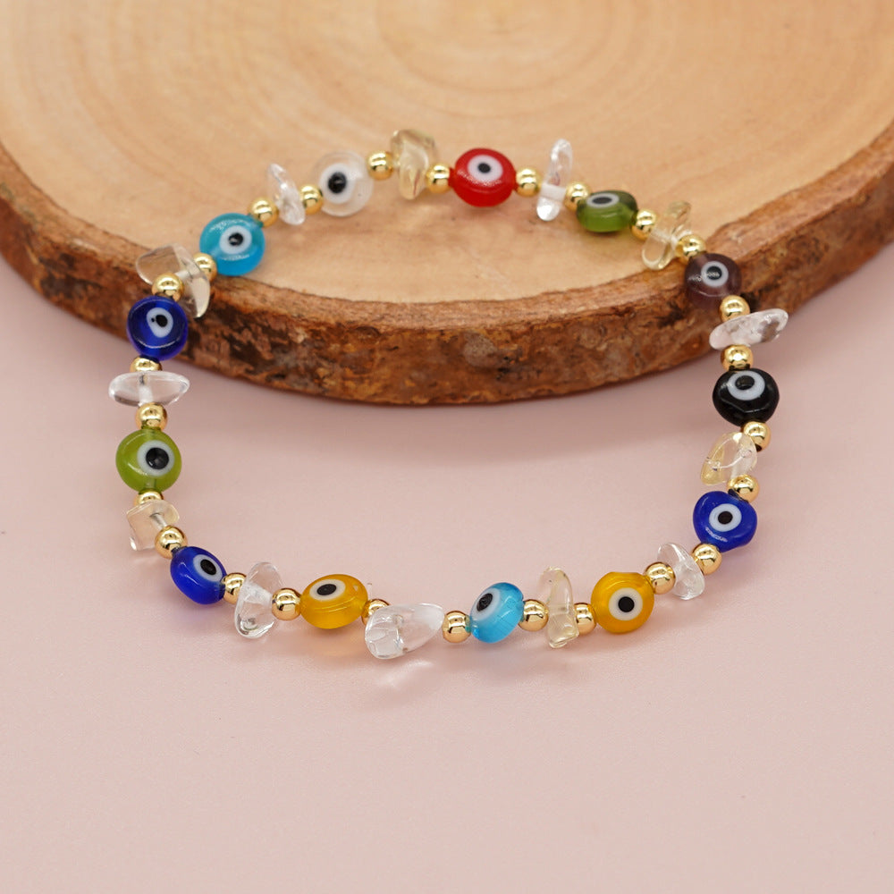 Bracelets boulier style boules dorées yeux en verre