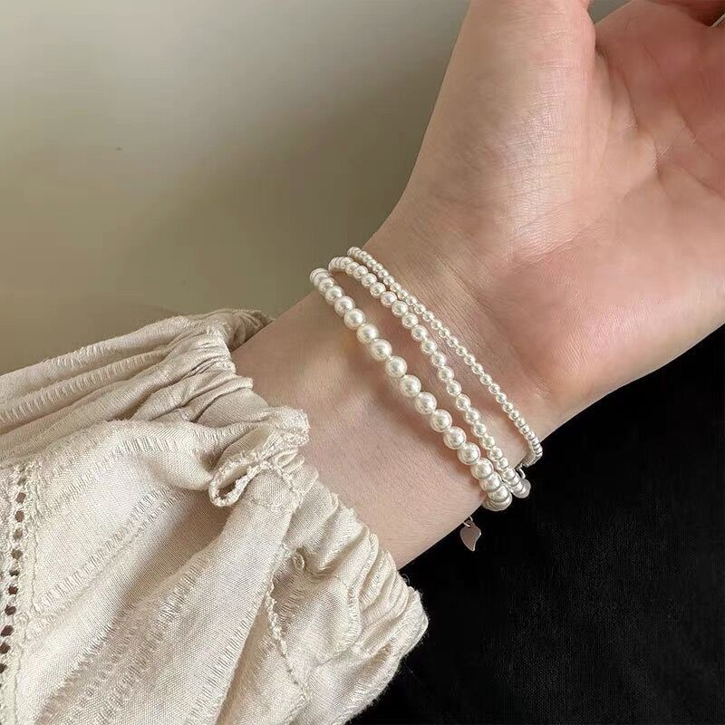 High Sense-Armbänder für Damen aus Sterlingsilber mit Pearl-Cold-Stil