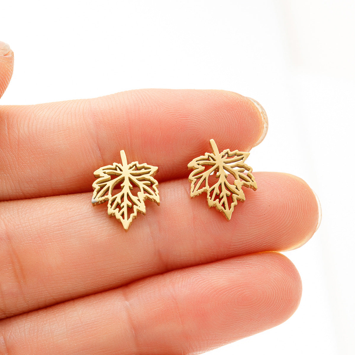 Fashion Personality Hollow Out Maple Leaf Light Earrings