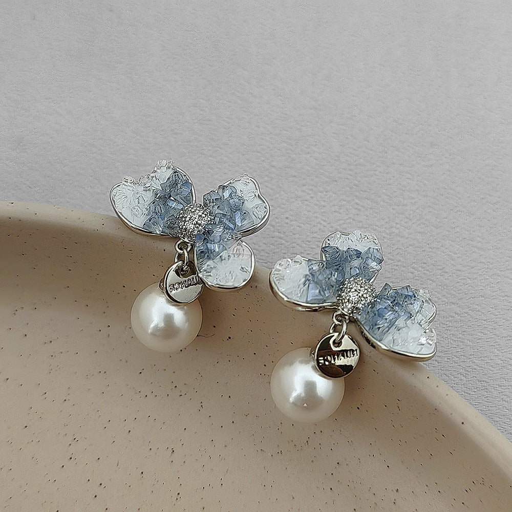 Anneaux de pétales de cristal bleu perle avec nœud de couleur