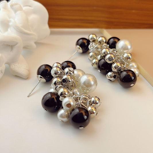 Boucles d'oreilles élégantes noires et blanches Zhang Long pour femmes