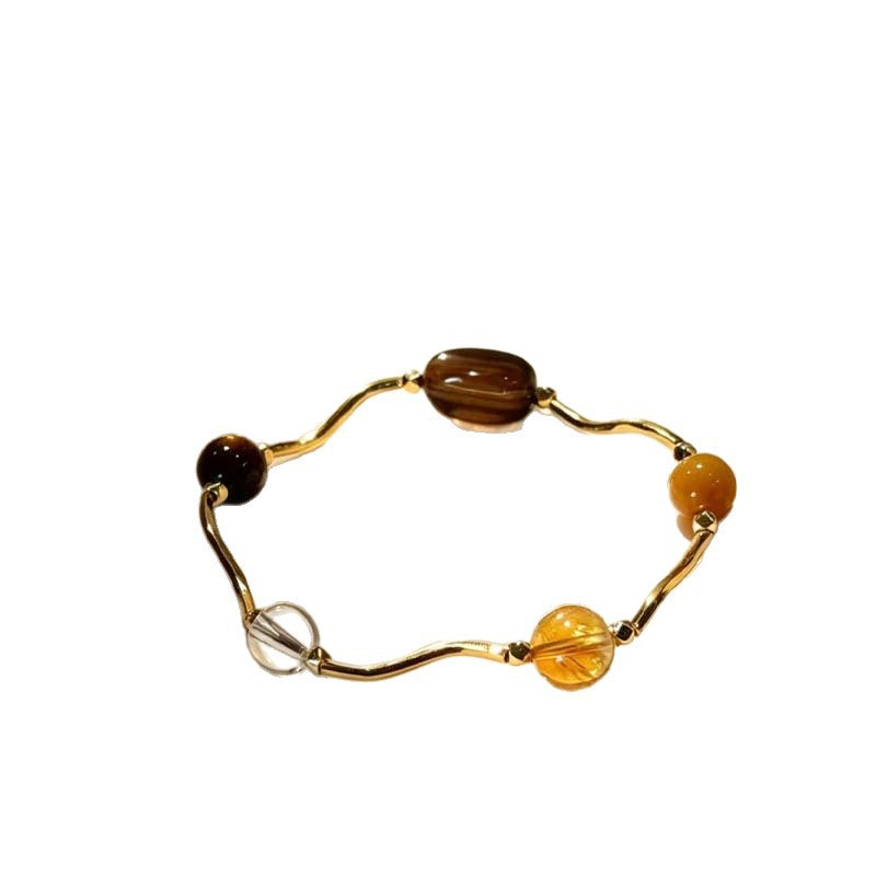 Women's Saturn Yellow Tiger Eyes Black Gold Bracelet