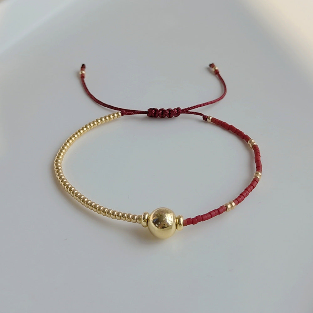 Kleine handgewebte farbige Armbänder für Damen mit zwei Perlen