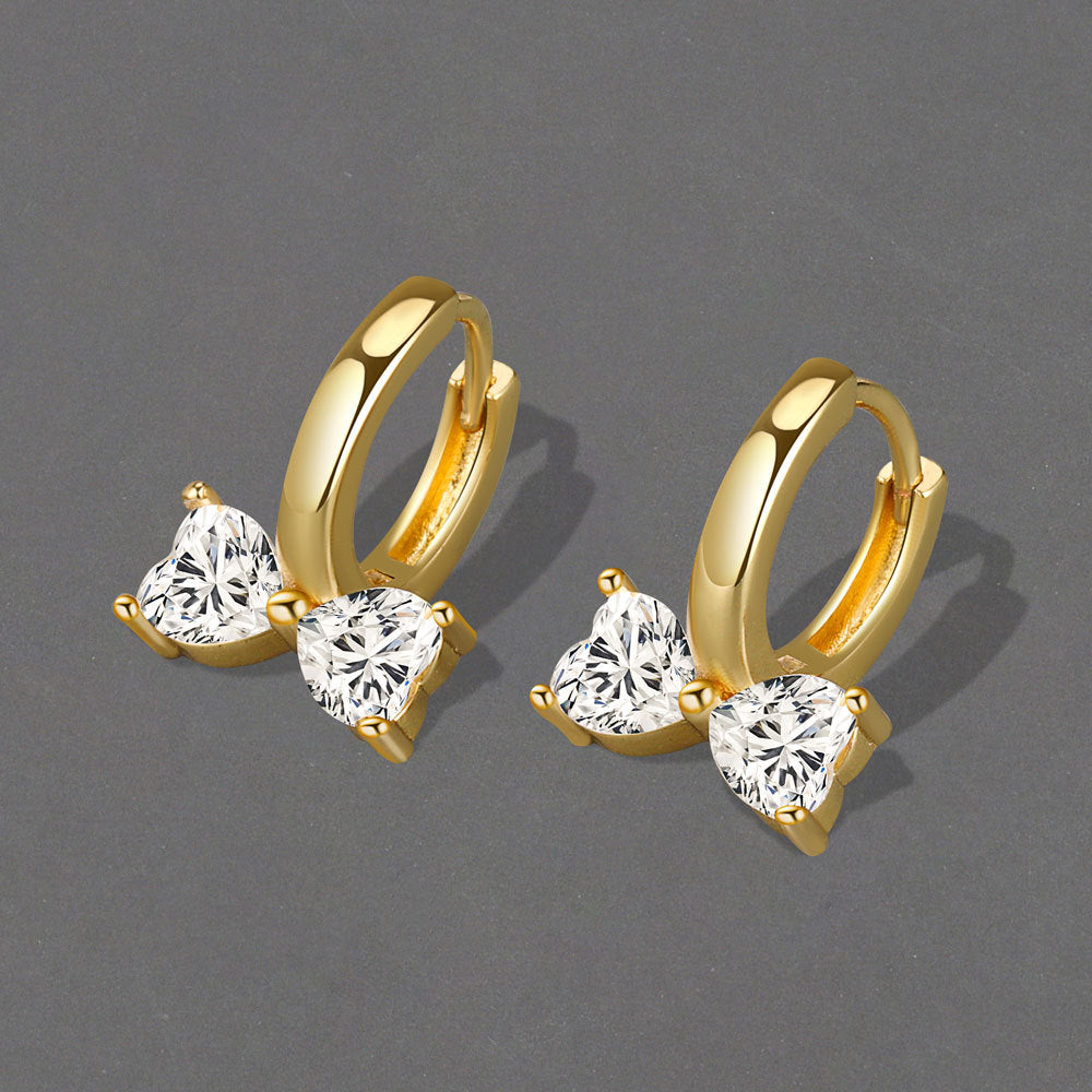 Petites boucles d'oreilles de niche en zircon incrusté de cuivre et nœud