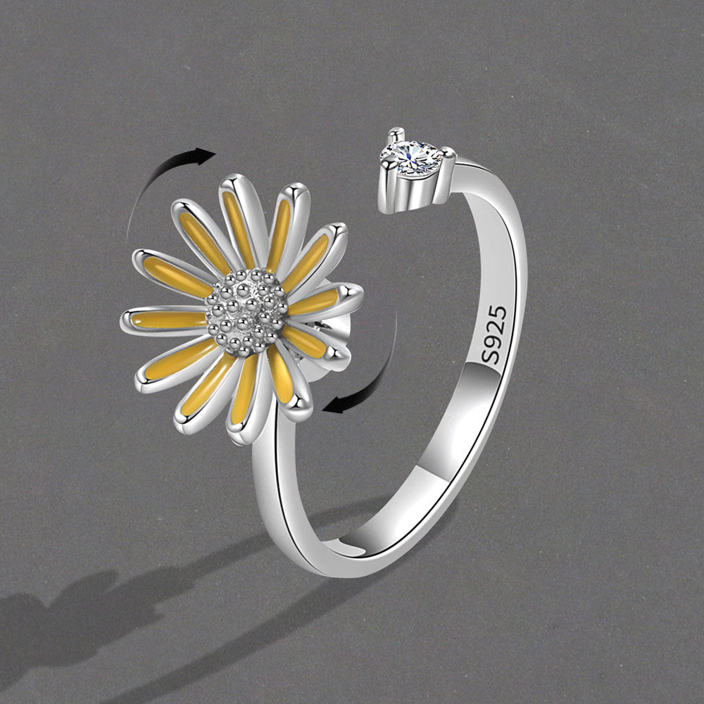 Drehbare Ringe aus Emaille mit kleinen Gänseblümchen für Damen von Fashionmonger